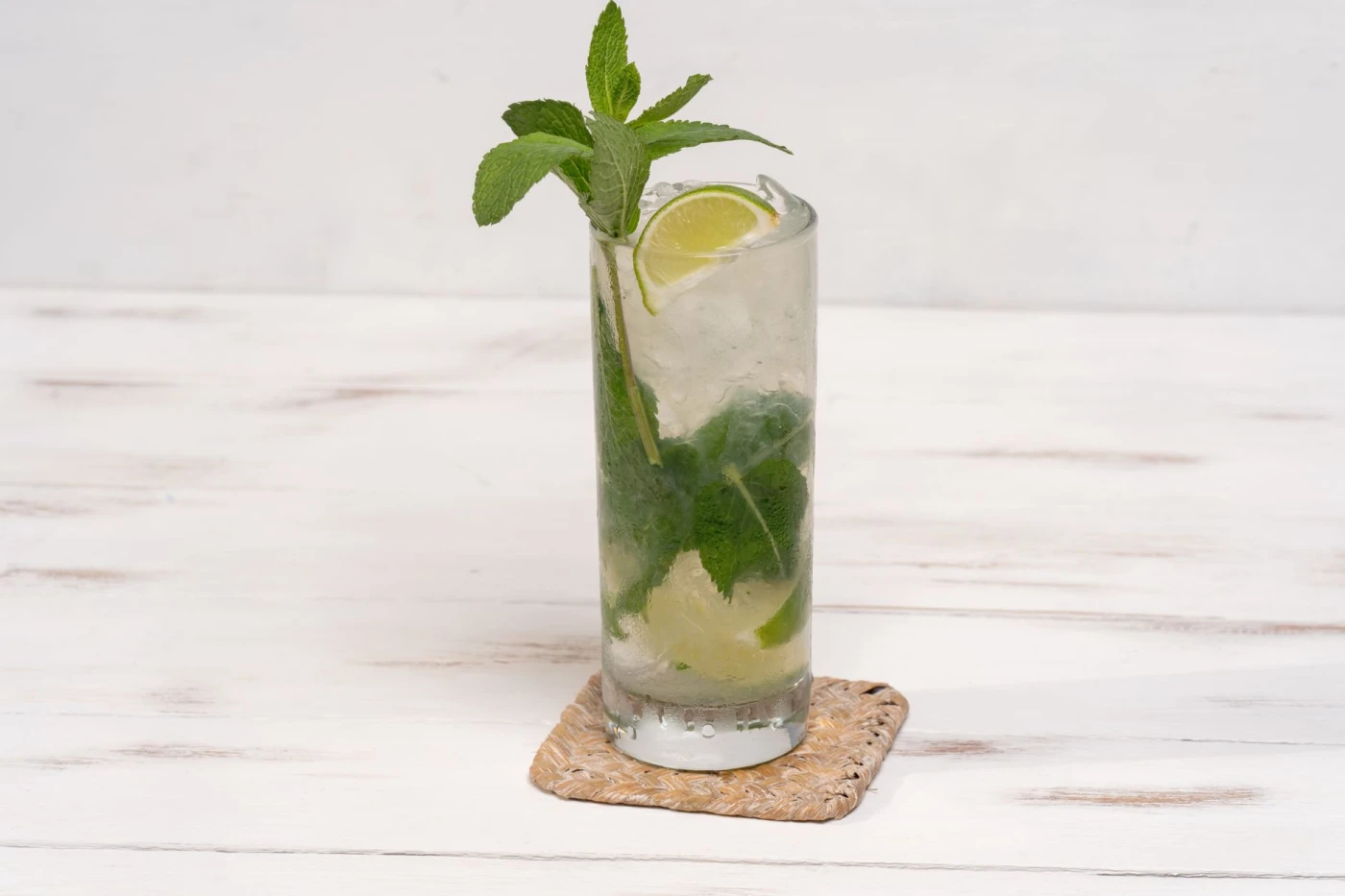 Bartender preparing a 1792 Kentucky White Dog Julep cocktail cocktail