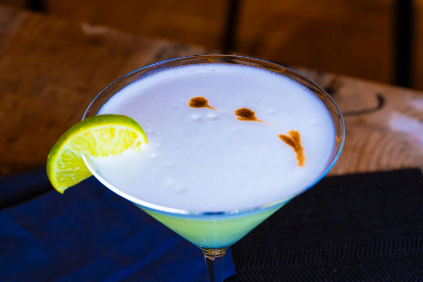 Absinthe Sour cocktail in a cocktail glass — cocktail drink photography