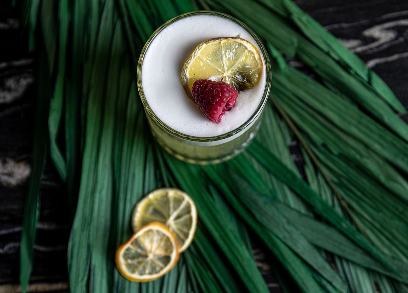 Bartender preparing a Absinthe Sour cocktail cocktail