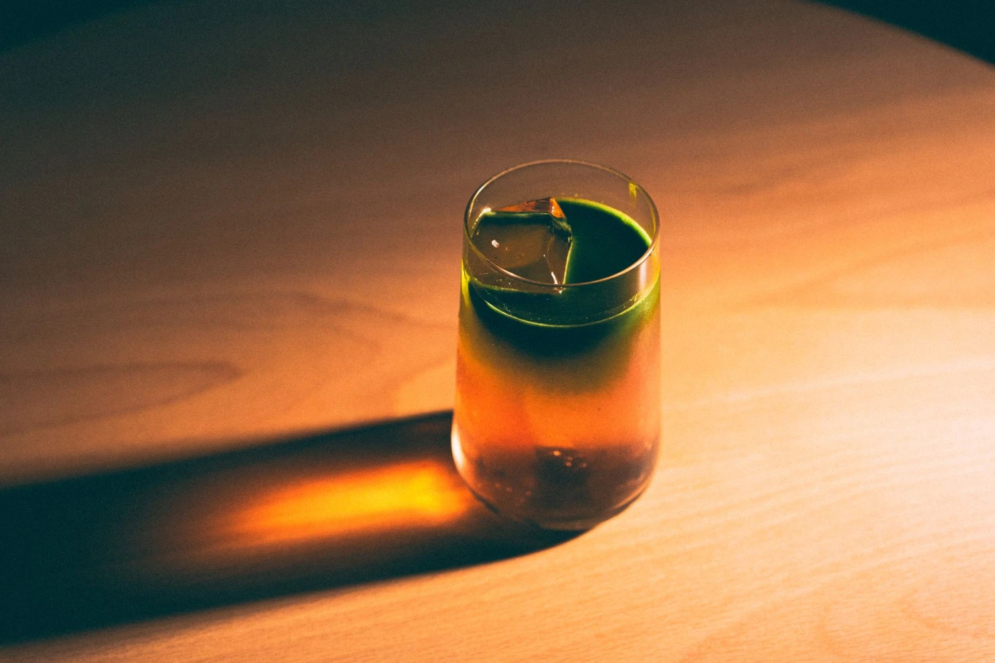 Achilles Heel cocktail in a cocktail glass — cocktail drink photography