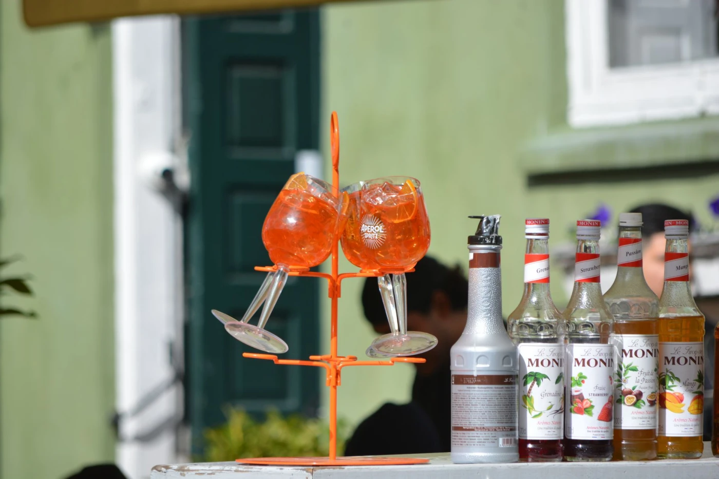 Aperol Spritz Pops cocktail garnish detail close-up