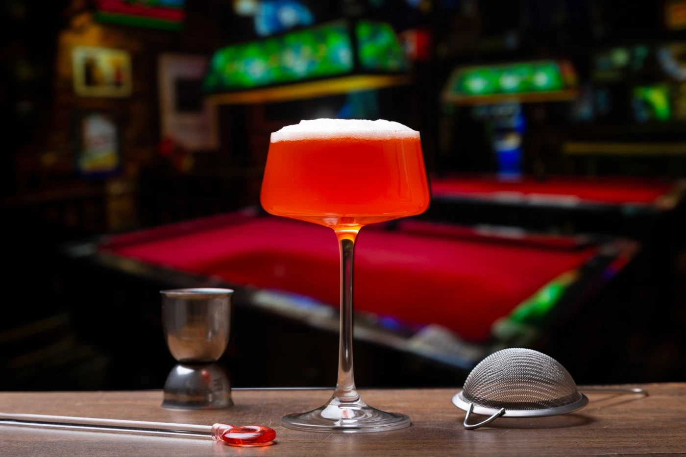 Bartender preparing a Clover Club cocktail cocktail