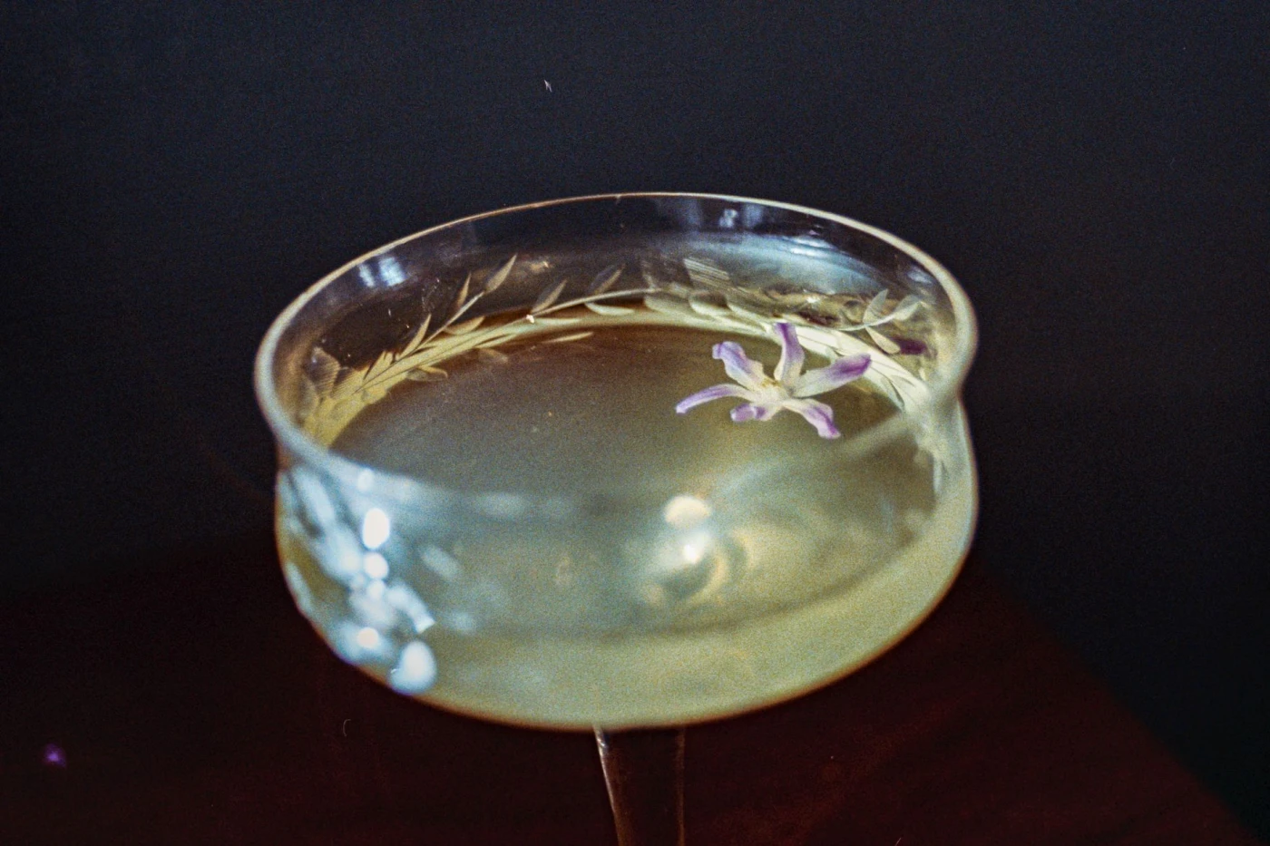 Death and Co.’s Corpse Reviver No. 2 ingredients with cocktail bottle and bar tools