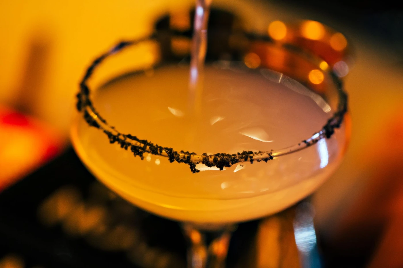 Bartender preparing a Death and Co.’s Corpse Reviver No. 2 cocktail