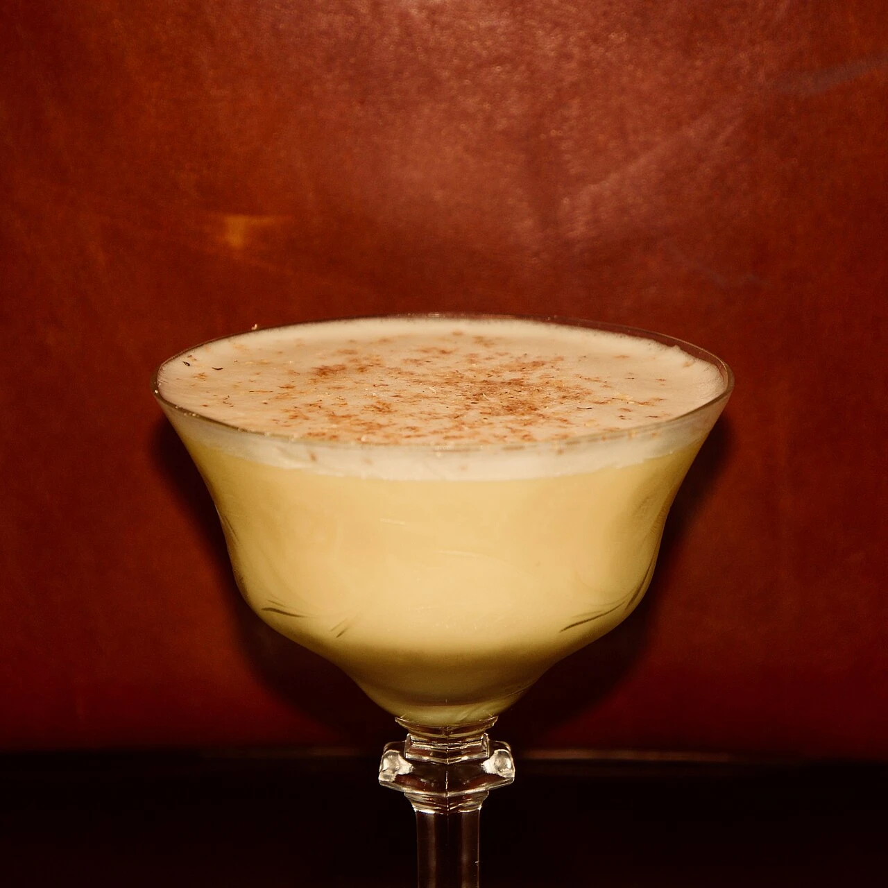 a Brandy Alexander: Brandy flip in stemmed cocktail glass.jpg