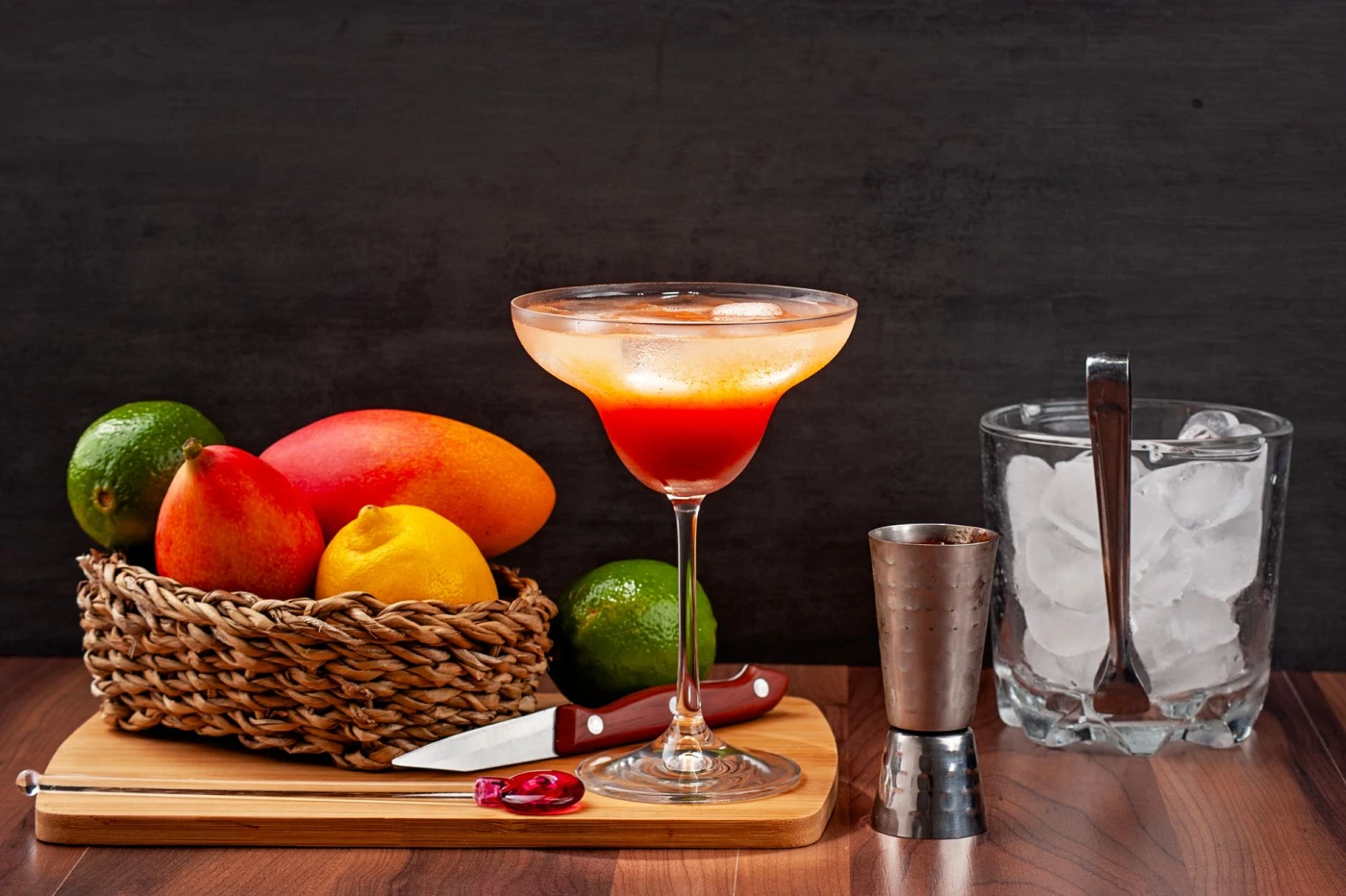 Bartender preparing a Rumba Libre rum cocktail
