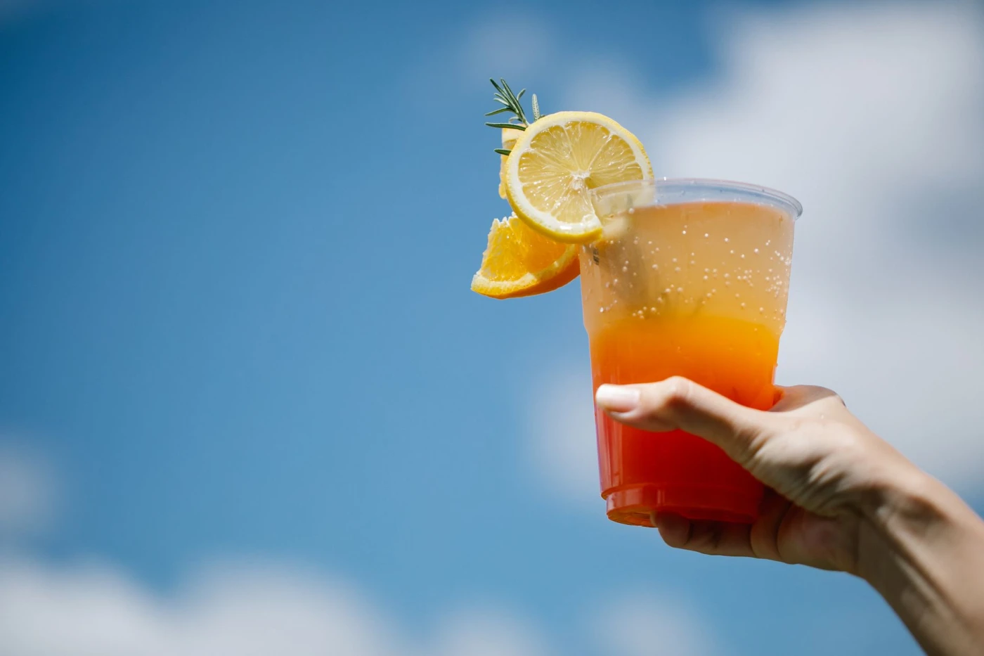 Best sol de la tarde: a bright paloma-style cocktail cocktail served in glass with ice