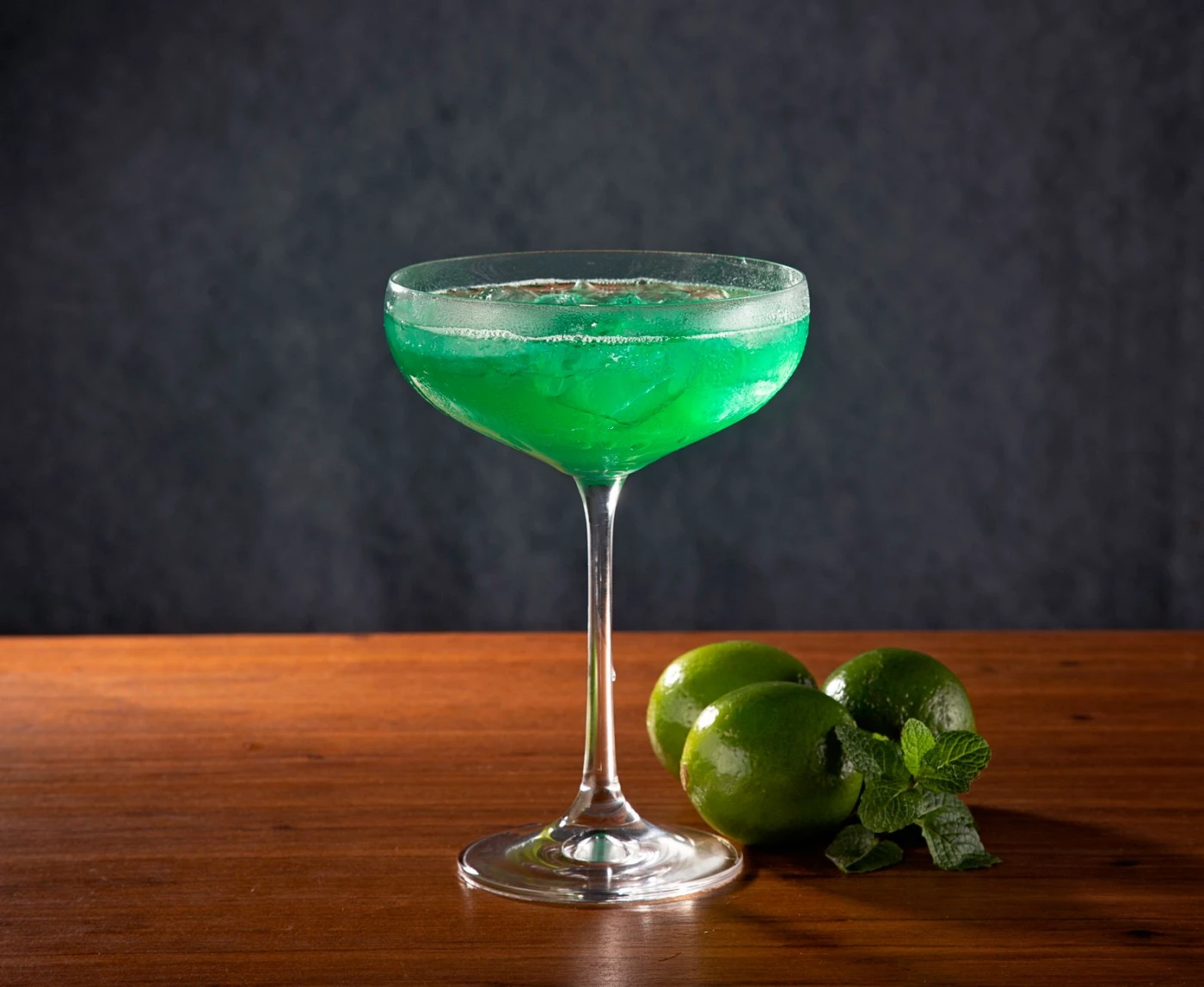 Bartender preparing a Stinger cocktail brandy cocktail