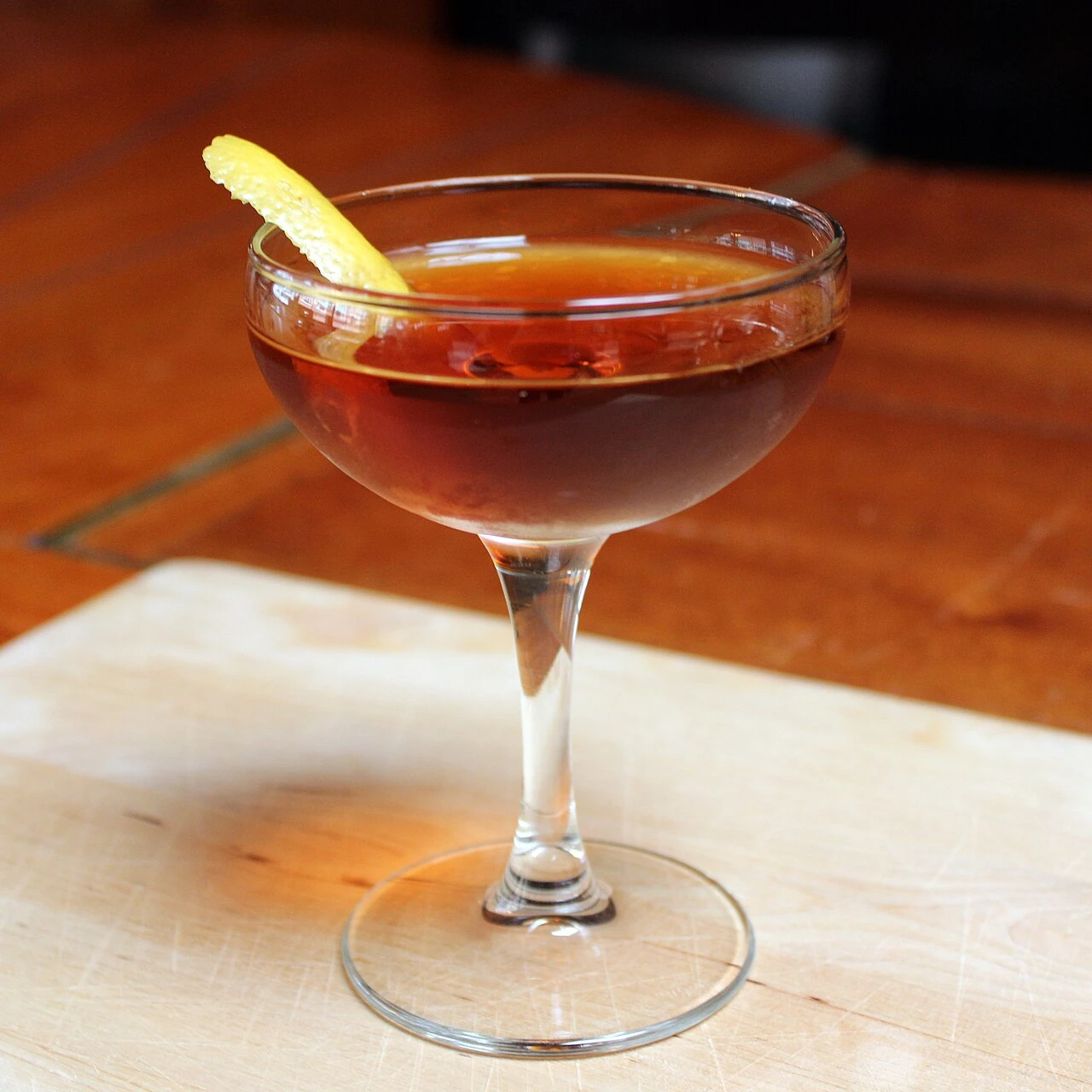The Martinez Cocktail cocktail in a cocktail glass — gin drink photography