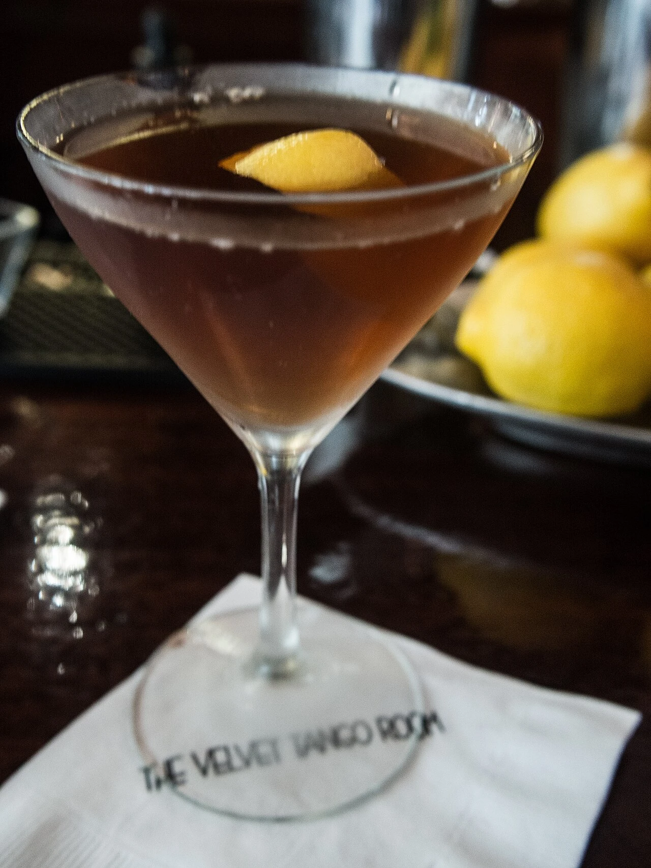 Bartender preparing a The Martinez Cocktail gin cocktail