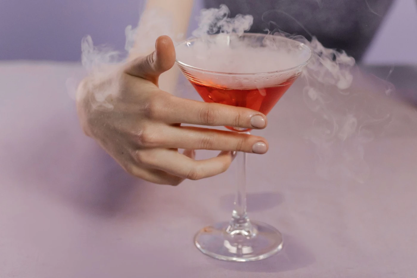 Bartender preparing a The Mystical One cocktail cocktail
