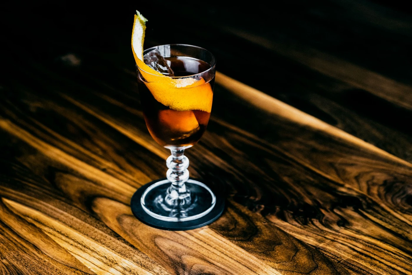 Gin, dry vermouth, maraschino, absinthe and bitters arranged with bar tools