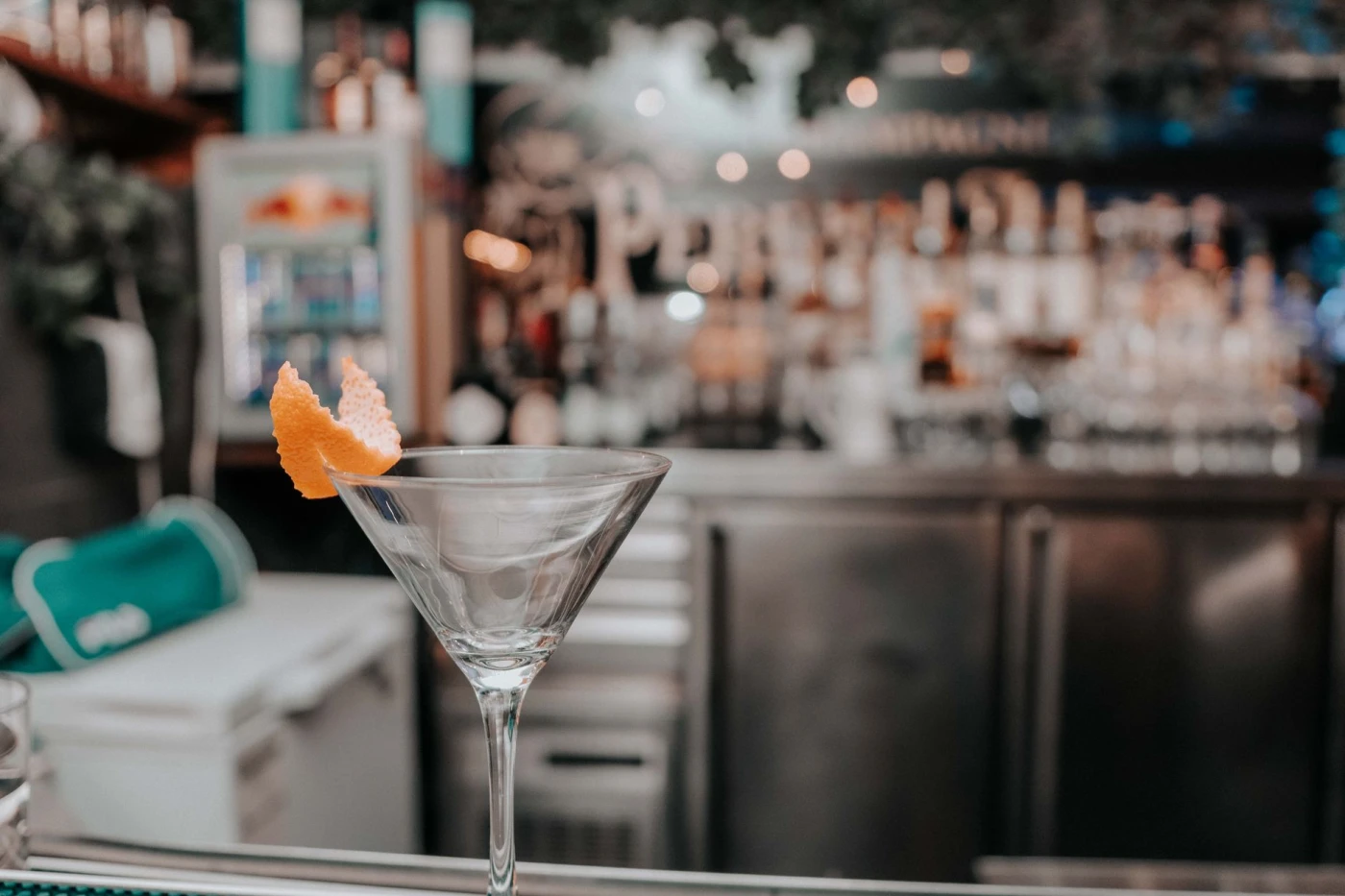 Bartender preparing a White Wine Martini vodka cocktail